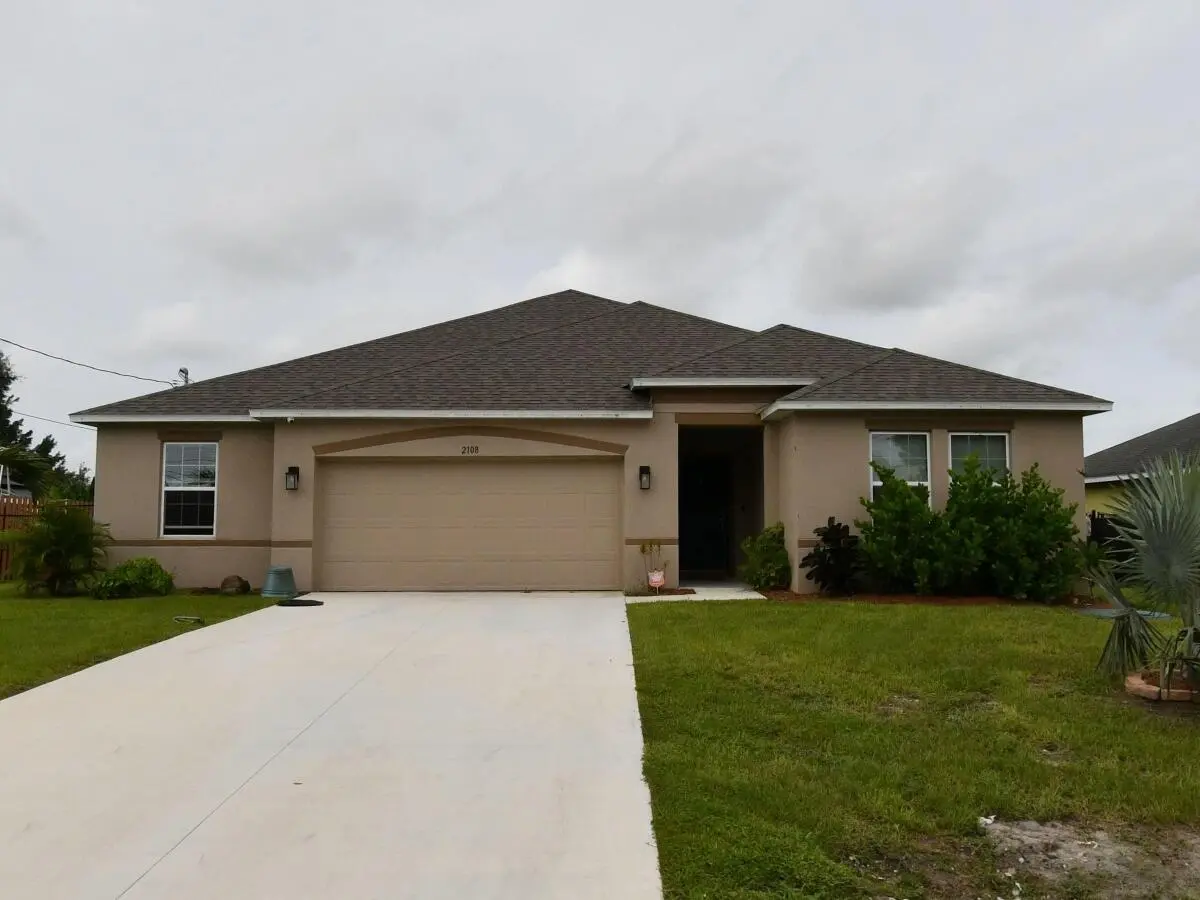 Photo Monterrey Ln PSL Front View at 2108 SW Monterrey Lane, Port St. Lucie