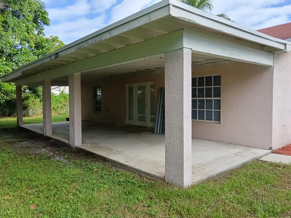 Large covered patio at 1704 Boardman Avenue, Mangonia Park