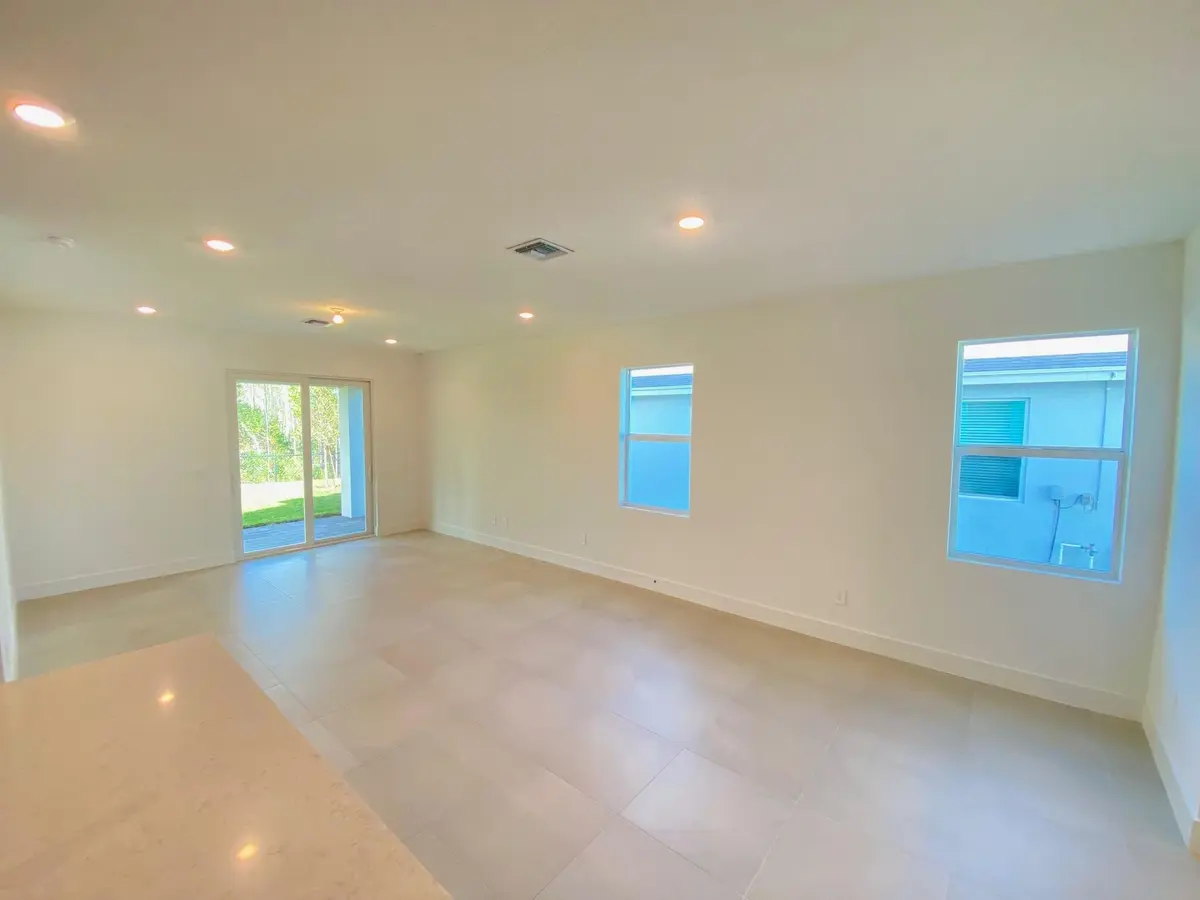 PPT 54 great room at 6970 SE Park Trace Drive, Stuart