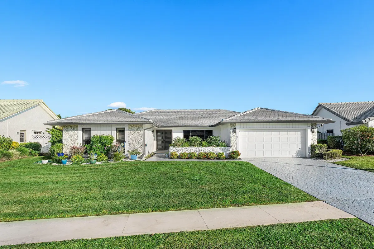 Front exterior at 10174 Crosswind Road, Boca Raton
