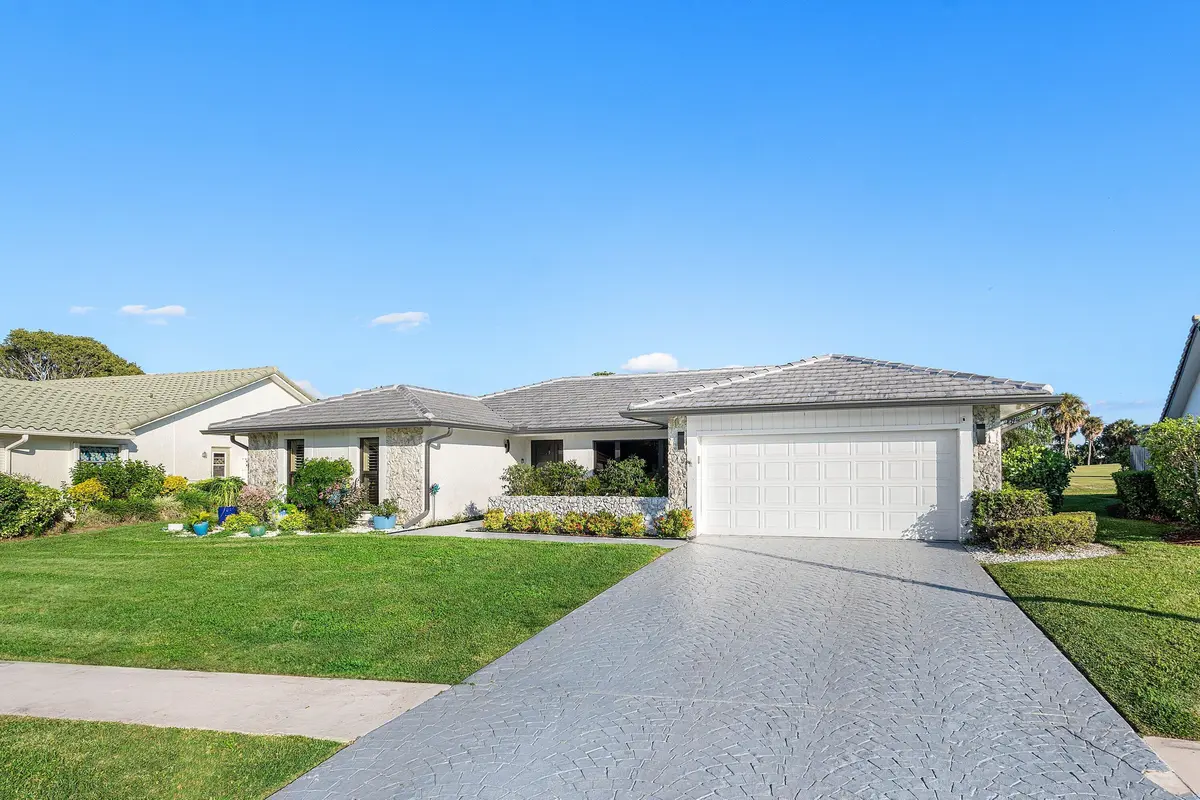 Front exterior at 10174 Crosswind Road, Boca Raton