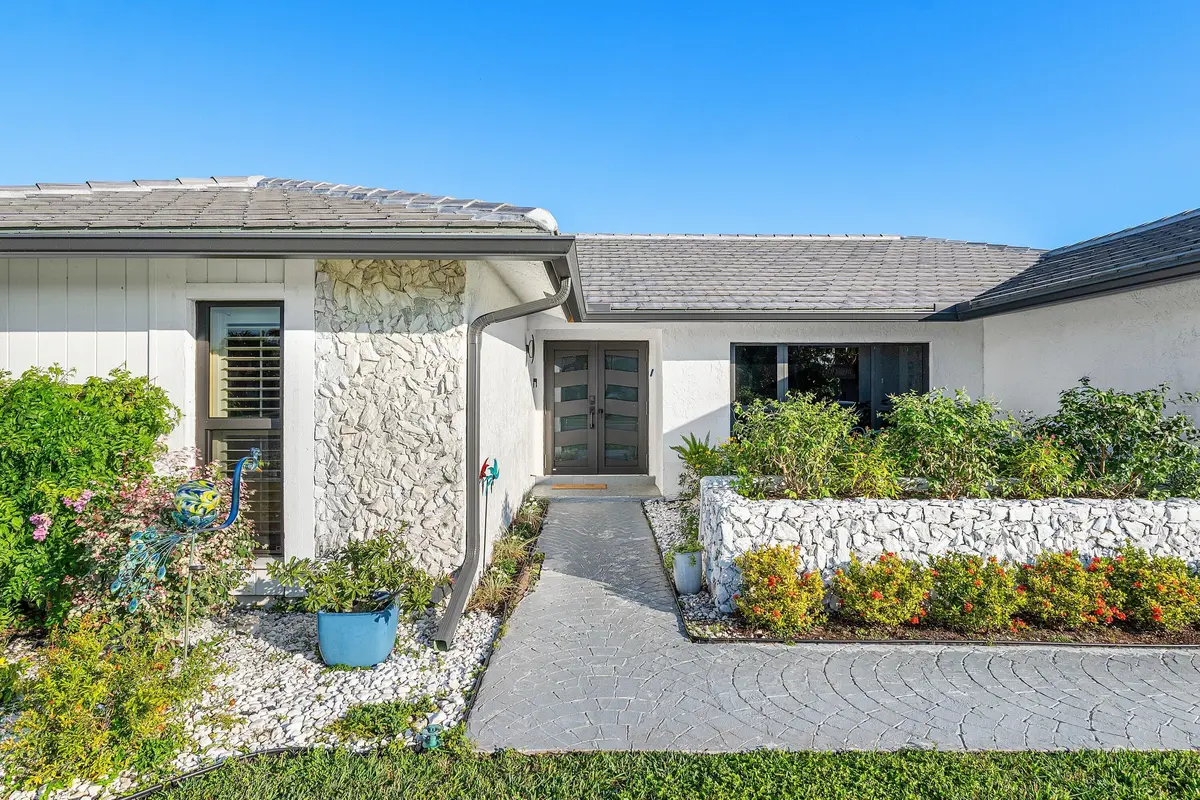 Front exterior at 10174 Crosswind Road, Boca Raton