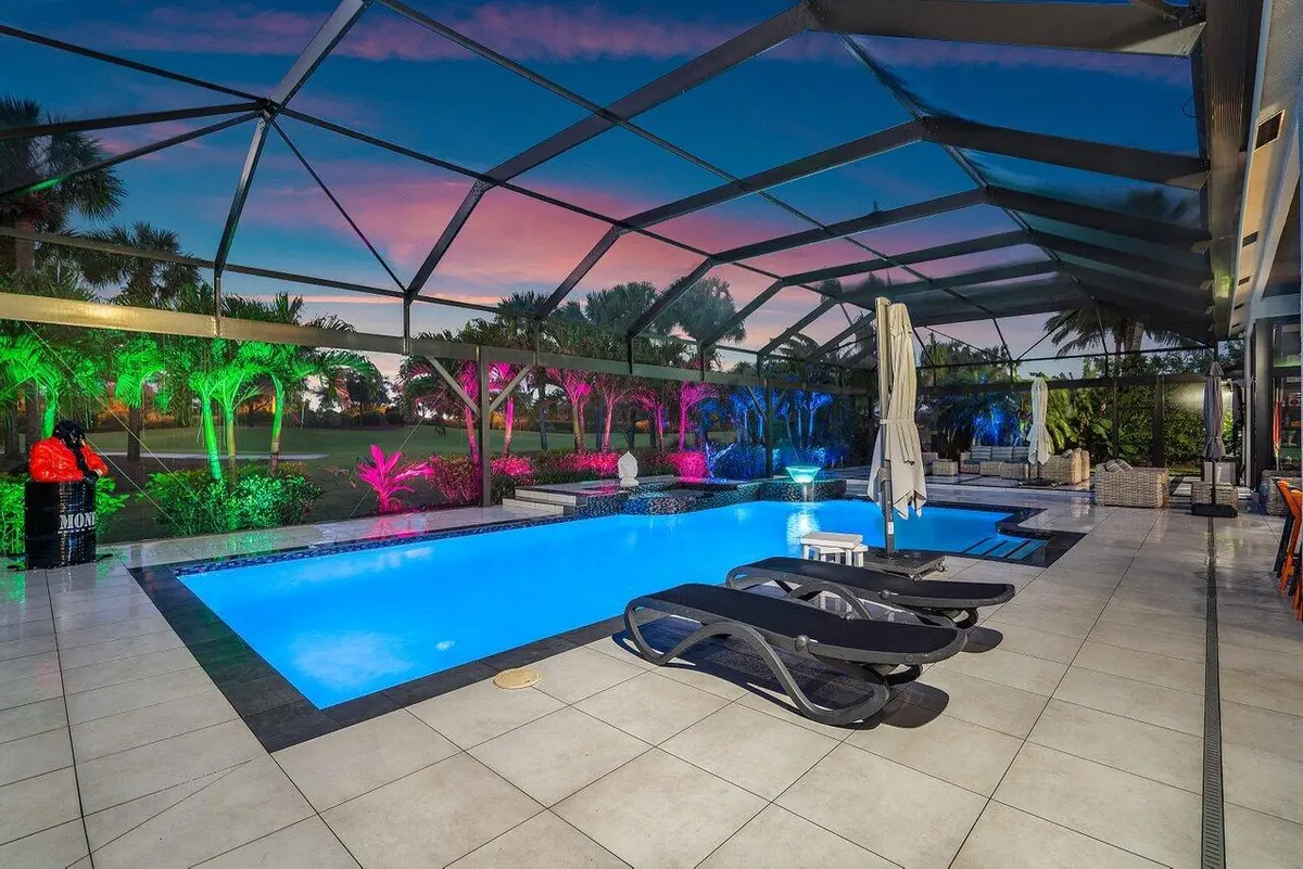Pool at night at 4848 Chamal Circle, Boca Raton
