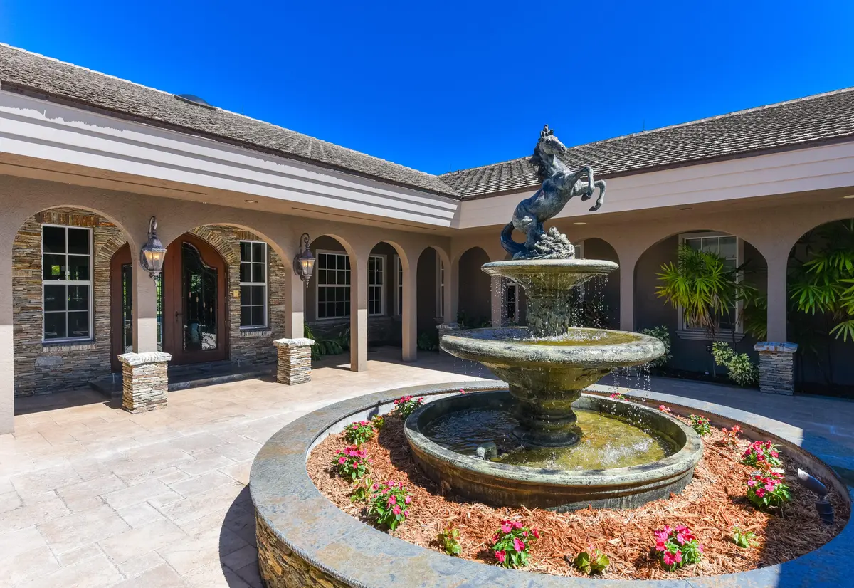 Front Exterior at 5205 SW Honey Terrace, Palm City