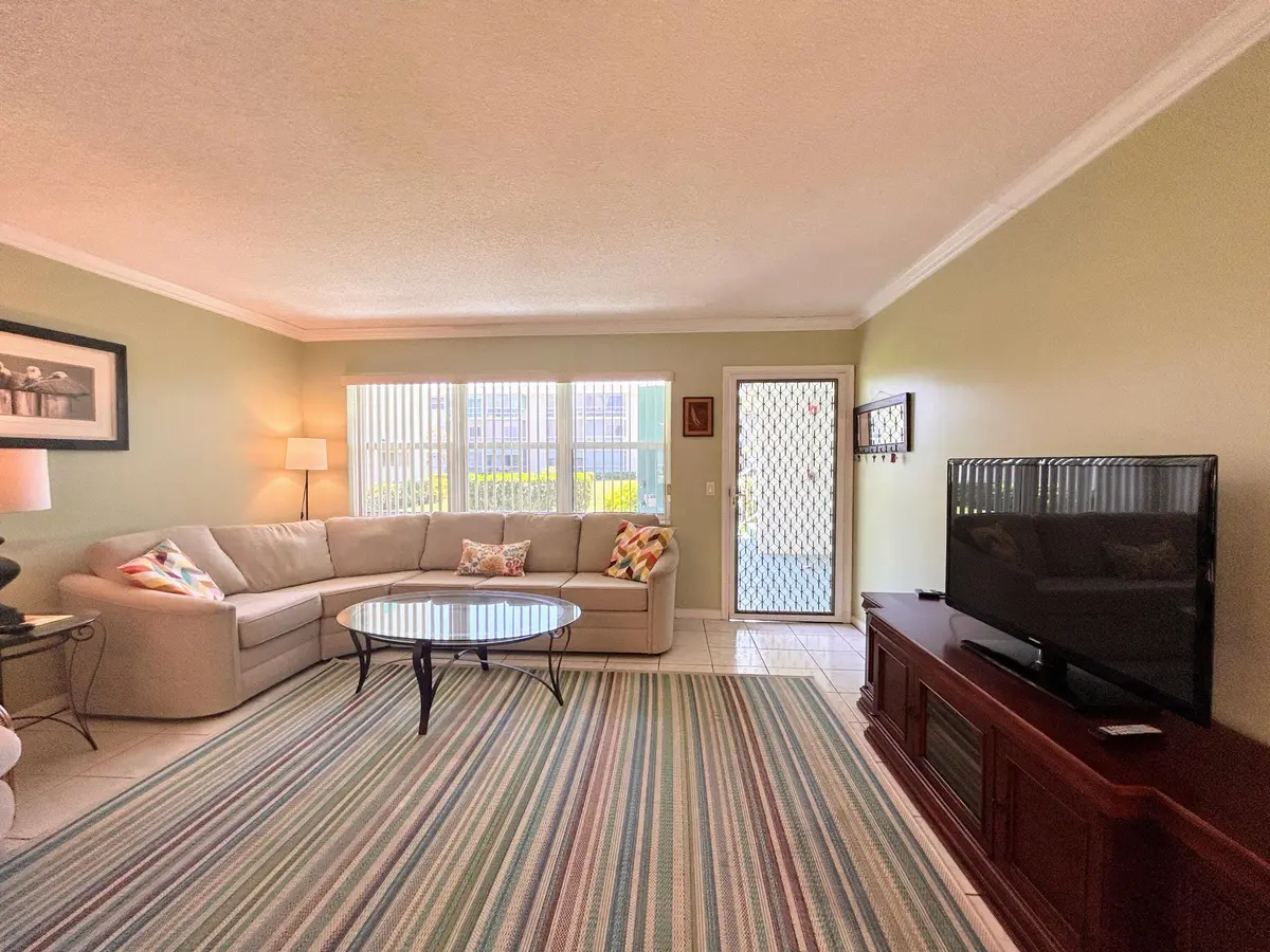 Large window, security door at 450 Horizons E 107, Boynton Beach