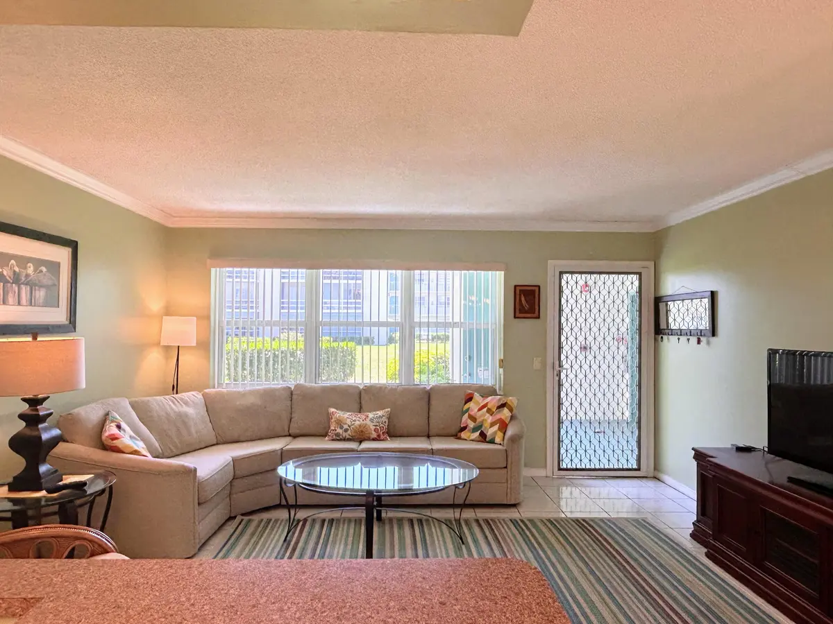 Security screen door at 450 Horizons E 107, Boynton Beach