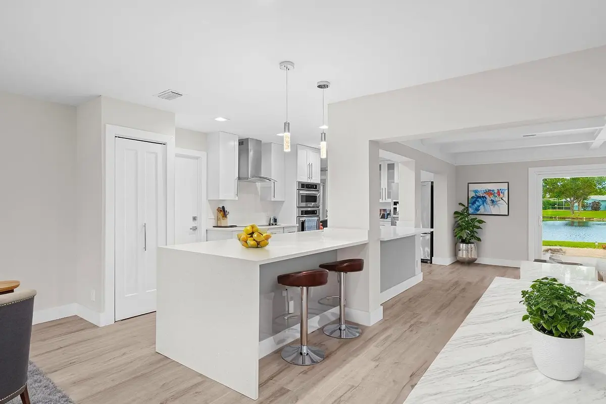 Kitchen Island Counters - Virtually Stag at 14624 Country Side Lane, Delray Beach