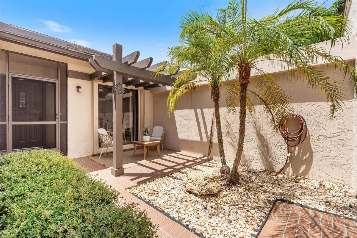 Courtyard Entry at 5272 Fairway Woods Drive 4113, Delray Beach