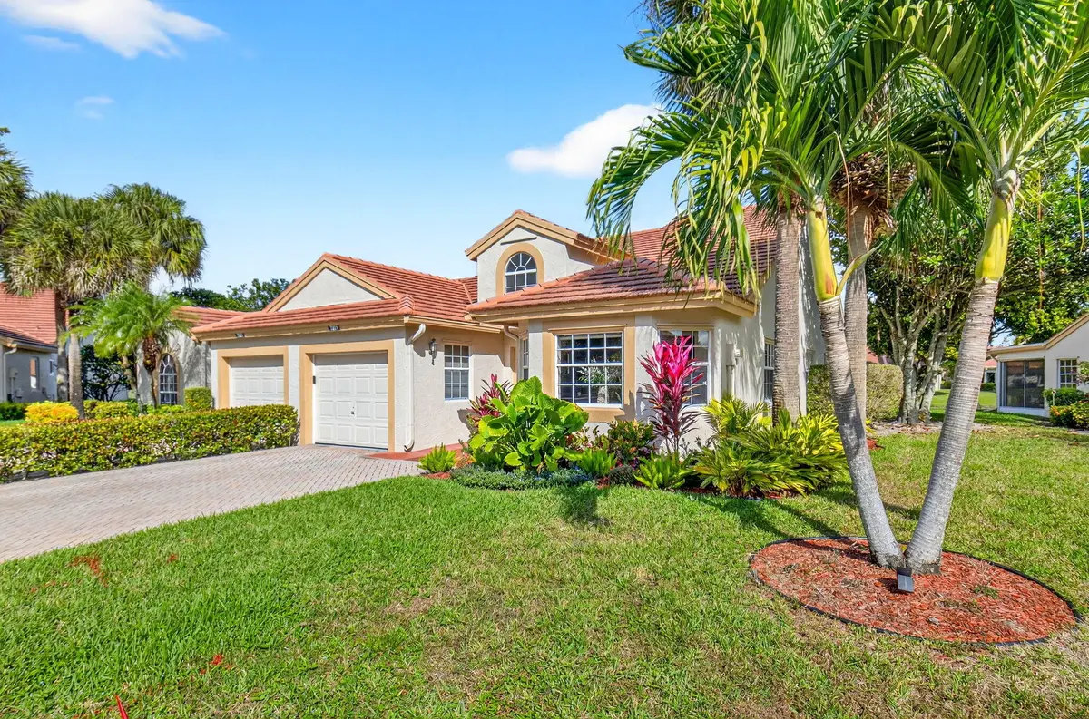 Corner Villa with Double Wide Driveway at 7921 Sandy Pointe Drive, Delray Beach