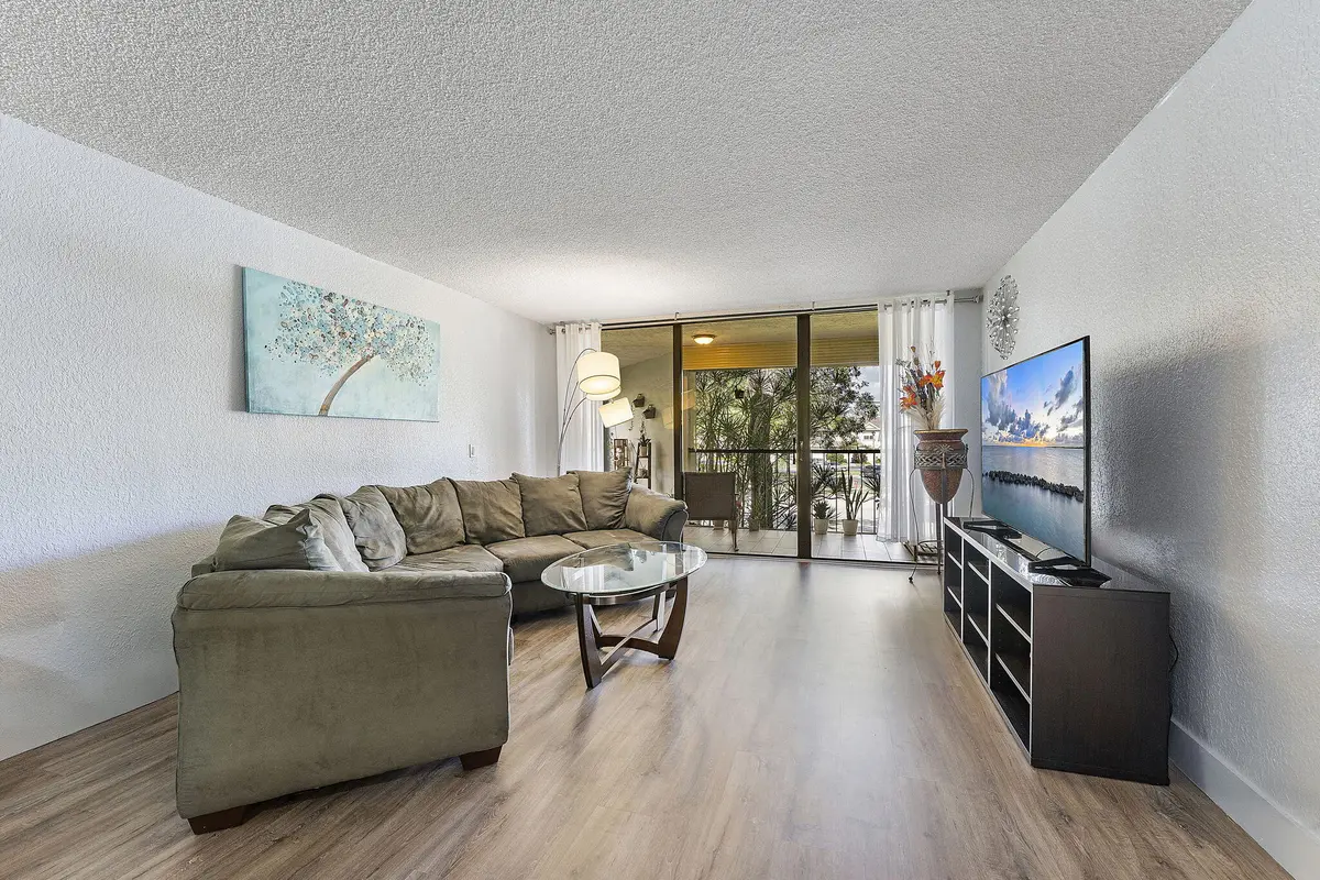 Living Room at 16475 Golf Club Road 207, Weston