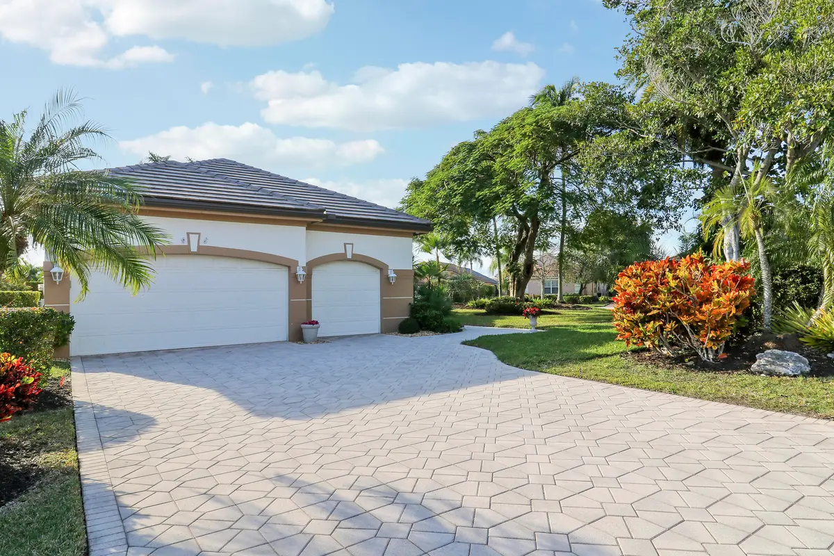 Large Driveway to 3 Car Garage at 8216 Cypress Point Road, West Palm Beach