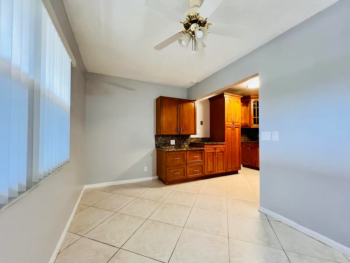 Dining to Kitchen at 210 Somerset K, West Palm Beach