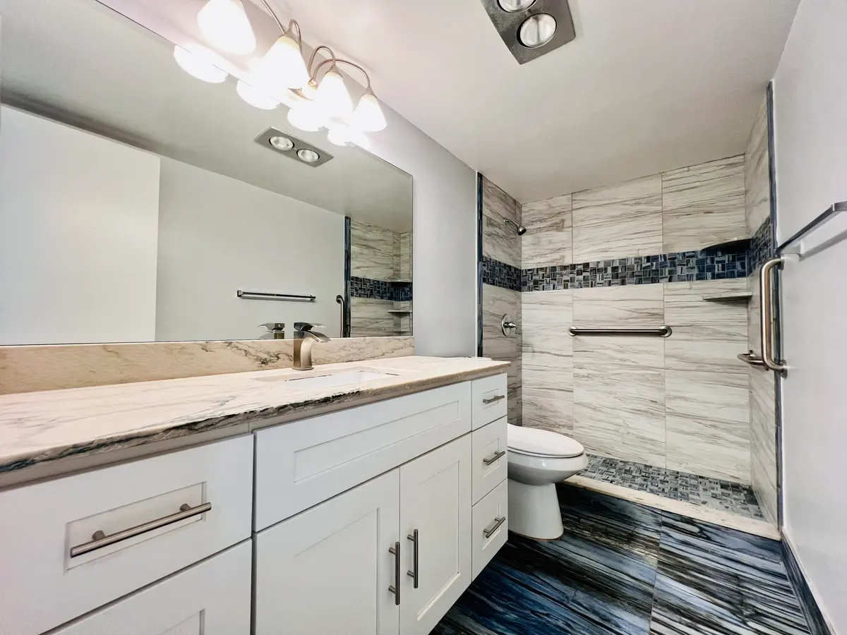One of Two Updated Full Baths at 210 Somerset K, West Palm Beach