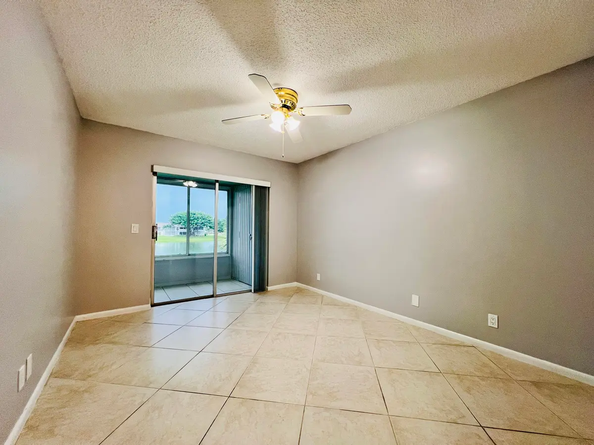 One of Two Water View Bedrooms at 210 Somerset K, West Palm Beach