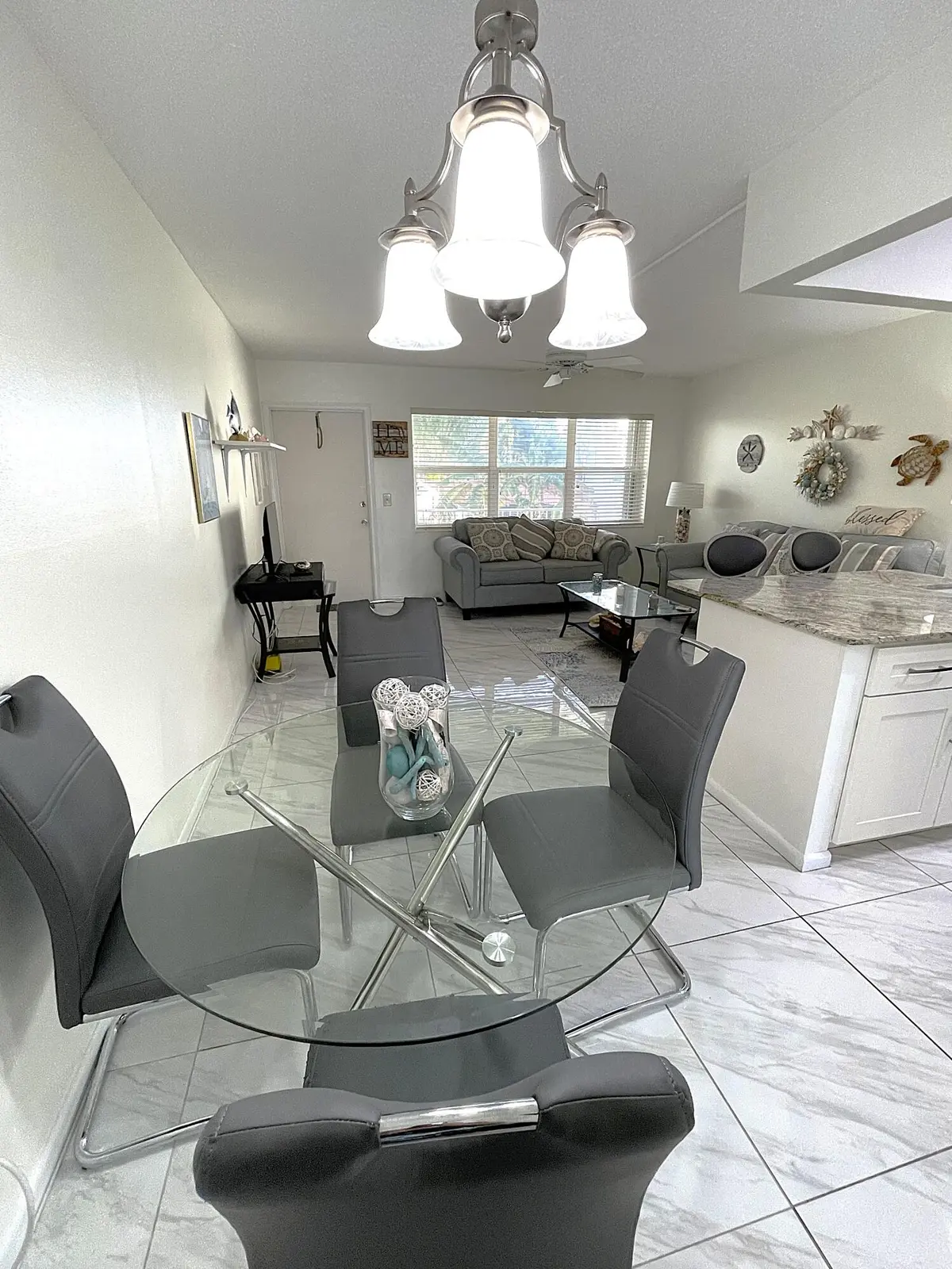 Dining Area to Living Room at 210 Horizons Street 207, Boynton Beach