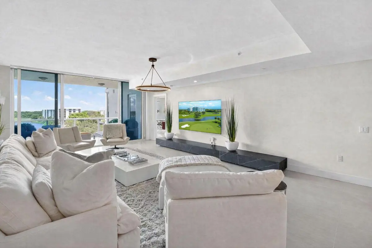 20155 Boca West - Living Room-TV at 20155 Boca West Drive C504, Boca Raton