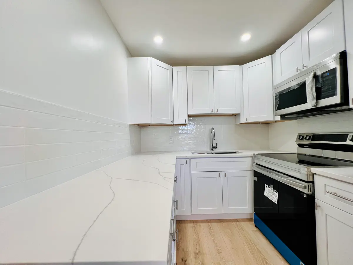 NEW Kitchen Additional View at 130 Chatham F, West Palm Beach