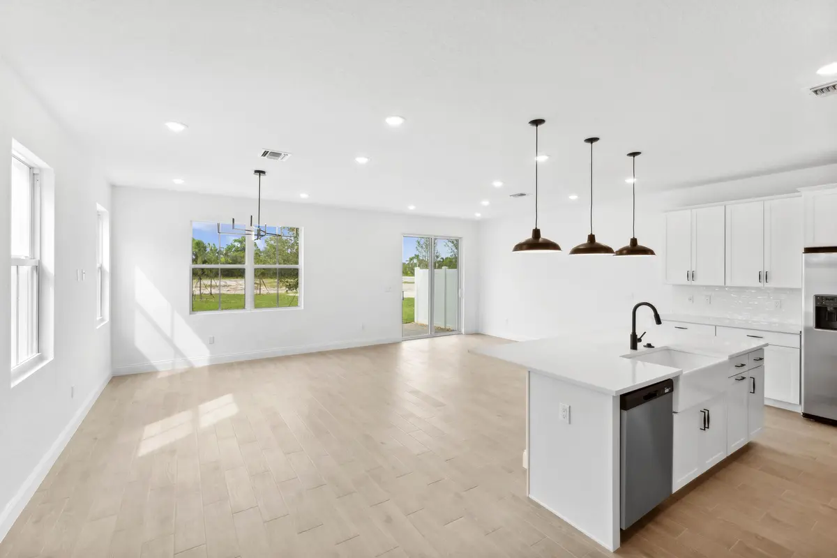 Kitchen, Dining Area & Great Room at 171 SE Birch Terrace 740, Stuart