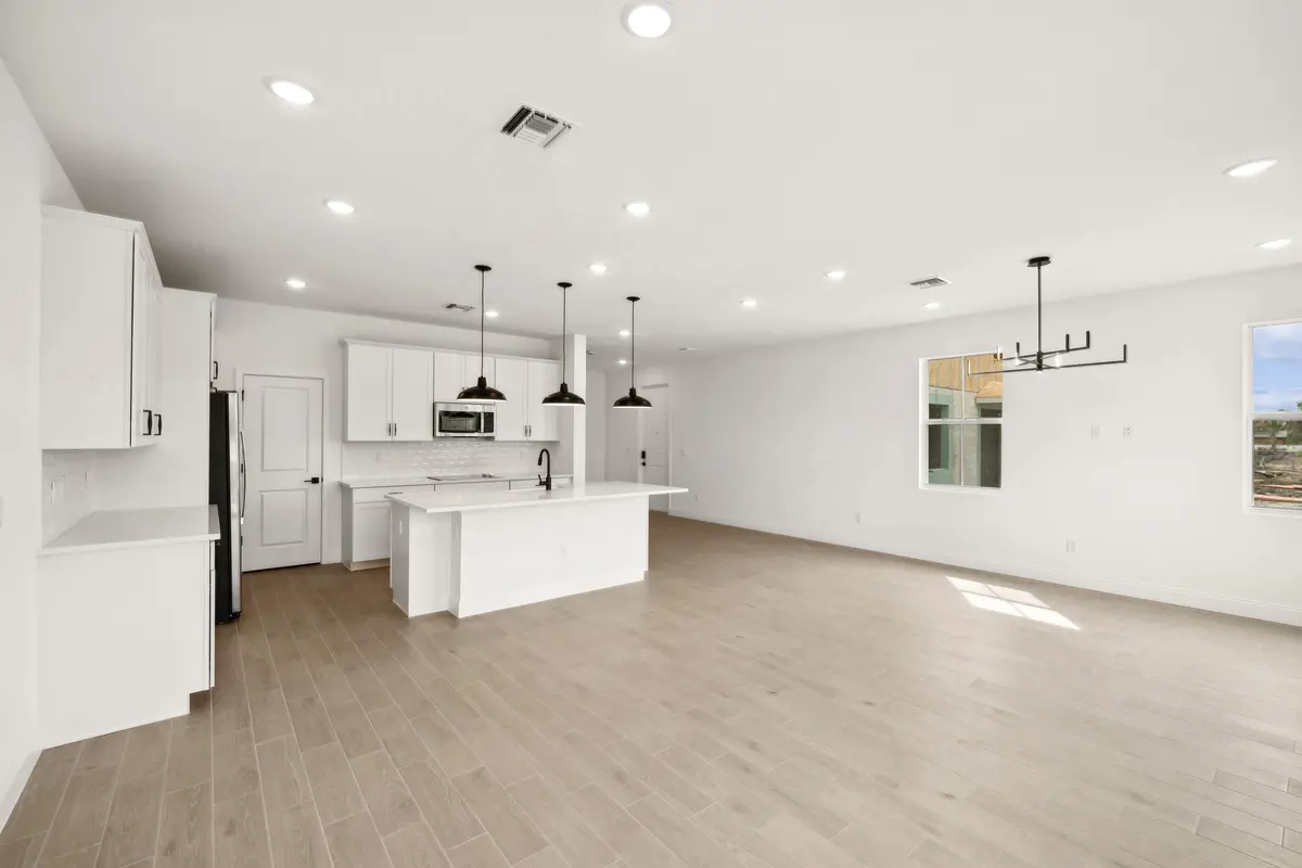 Kitchen, Dining Area & Great Room at 171 SE Birch Terrace 740, Stuart