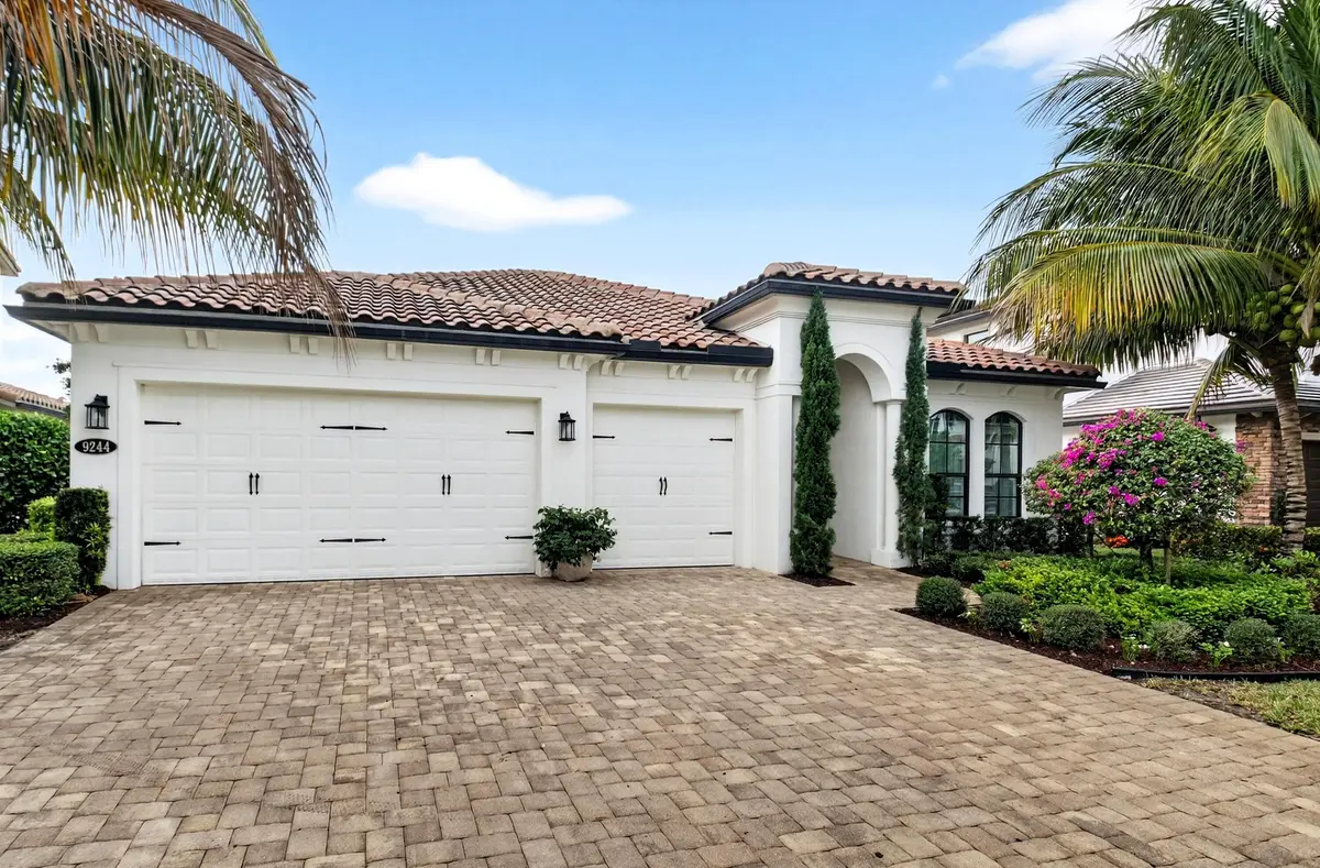2 9244 front elevation 3 car garage at 9244 Grand Prix Lane, Boynton Beach
