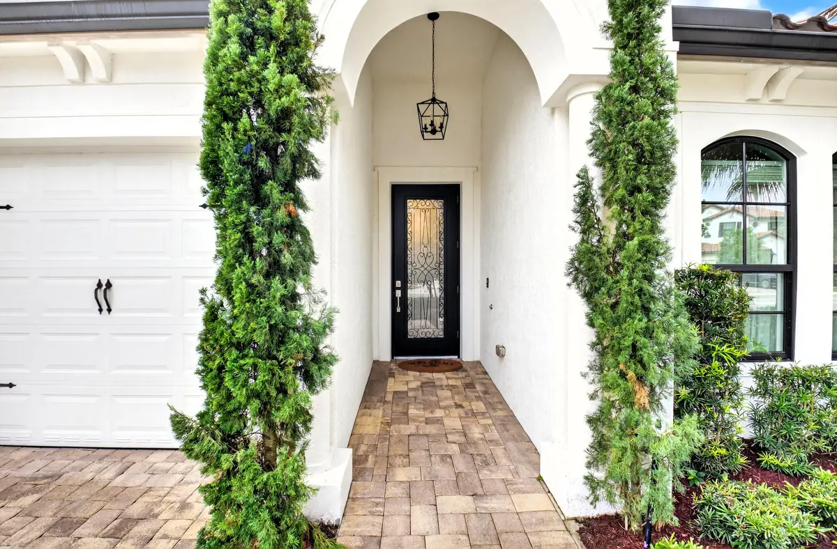 3 9244 exterior foyer at 9244 Grand Prix Lane, Boynton Beach