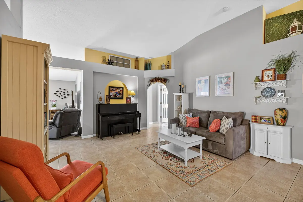 Living room at 6141 NW Wild Cotton Way, Port St. Lucie