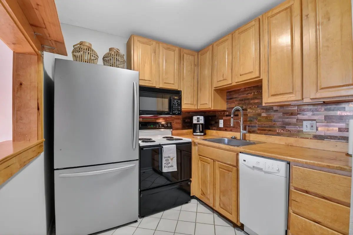 custom wood kitchen at 3160 Lake Osborne Dr 107, Lake Worth Beach