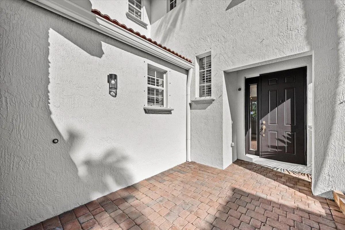 Inviting Courtyard Entry at 1062 Vintner Boulevard, Palm Beach Gardens