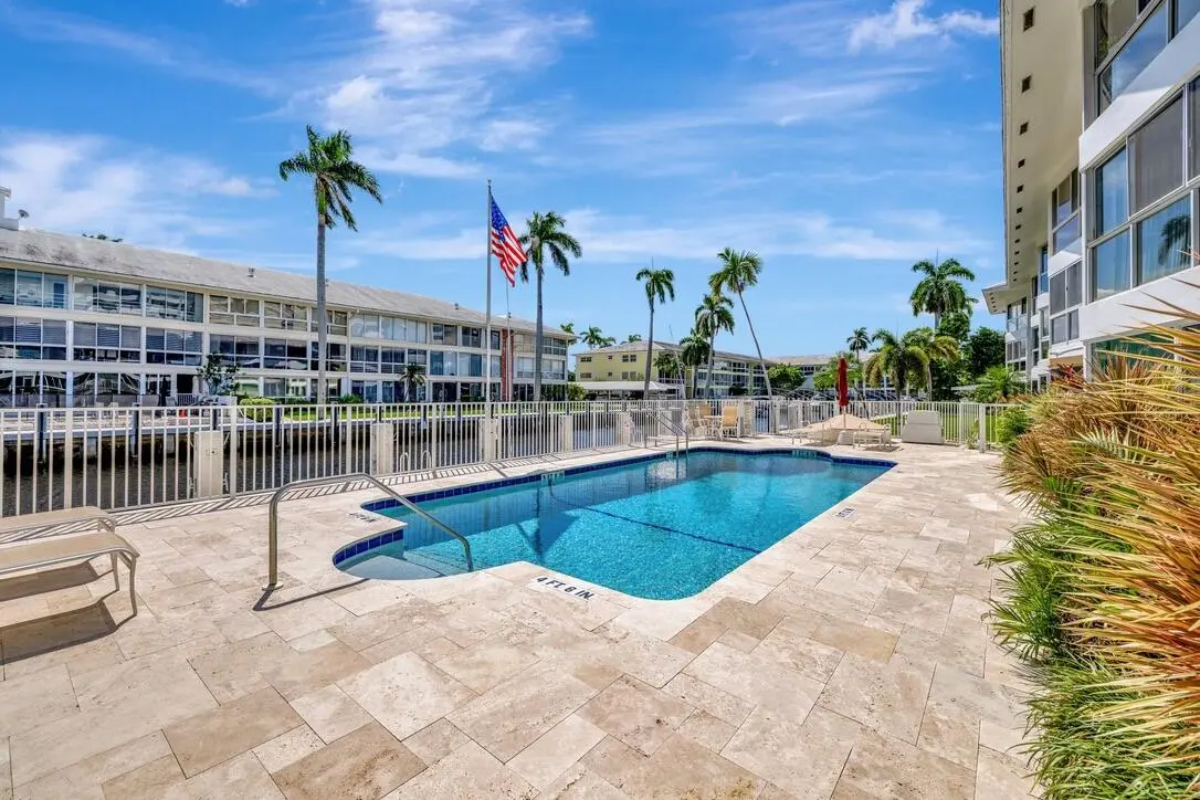 Travertine Pool Deck at 3050 NE 48th Street 107, Fort Lauderdale