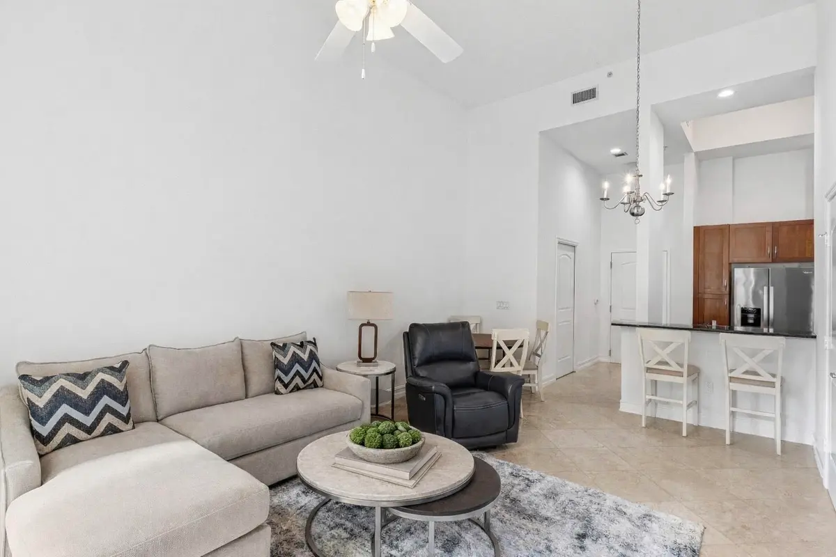 Living Room w/ New Furniture at 701 S Olive Avenue 305, West Palm Beach