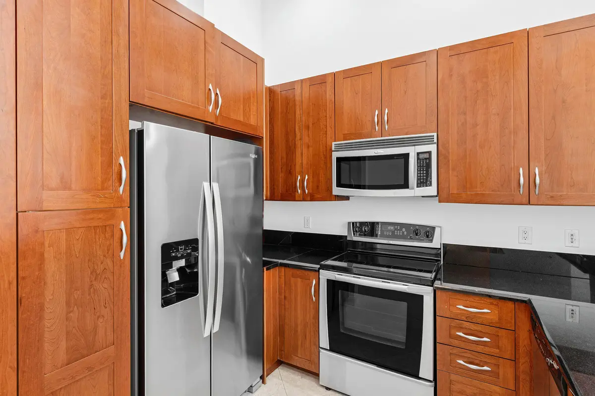 Kitchen w/ Large COunter Space at 701 S Olive Avenue 305, West Palm Beach