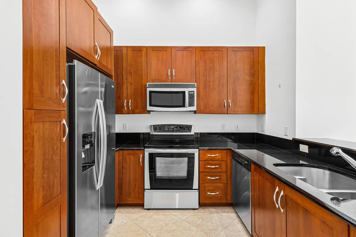 Ample Kitchen Cabinetry at 701 S Olive Avenue 305, West Palm Beach