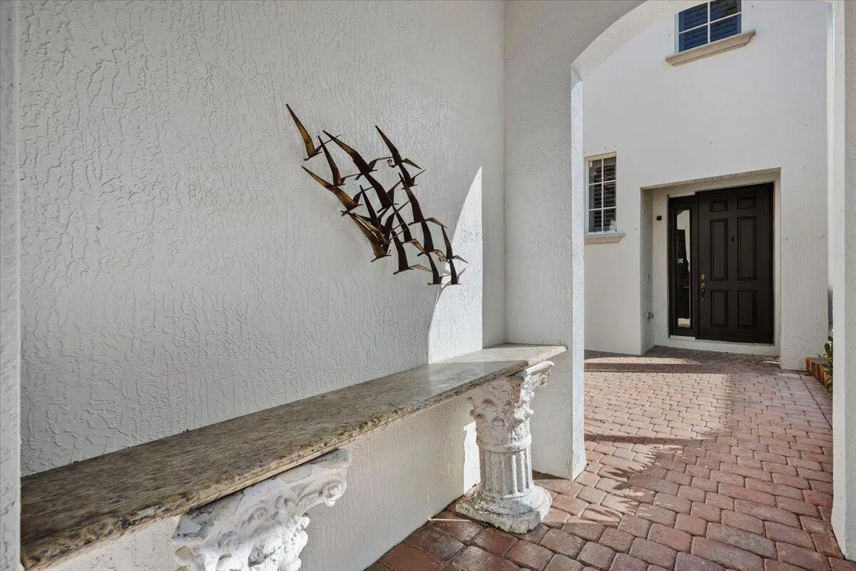 Inviting Courtyard Entry at 1062 Vintner Boulevard, Palm Beach Gardens