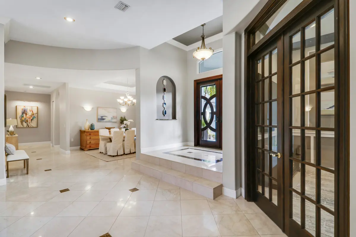 Hallway Facing Foyer and Dining Room at 18512 SE Old Trail Drive, Jupiter