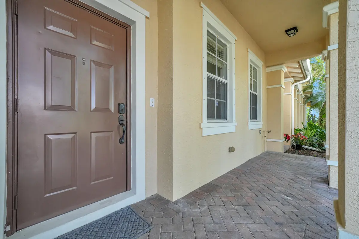 Front Entry With Covered Porch at 285 E Bay Cedar Circle, Jupiter