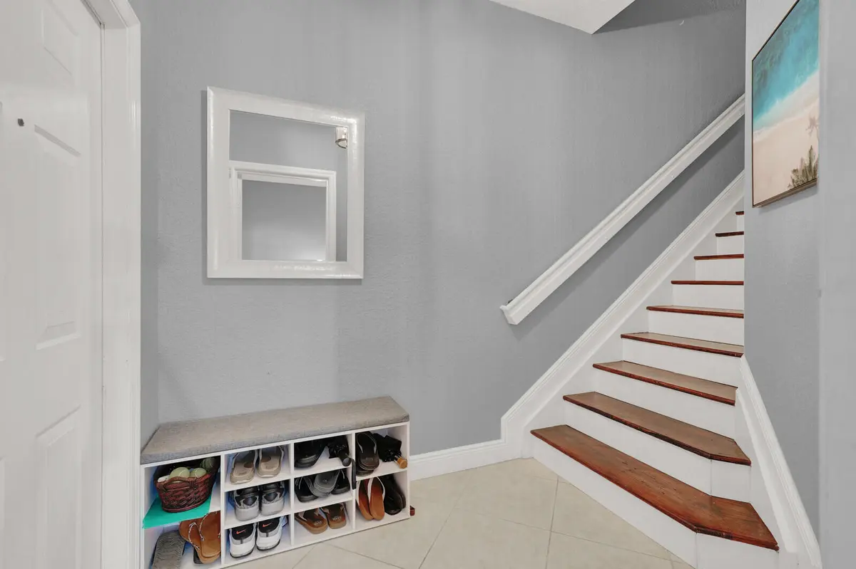 Stairs to Main Level at 285 E Bay Cedar Circle, Jupiter