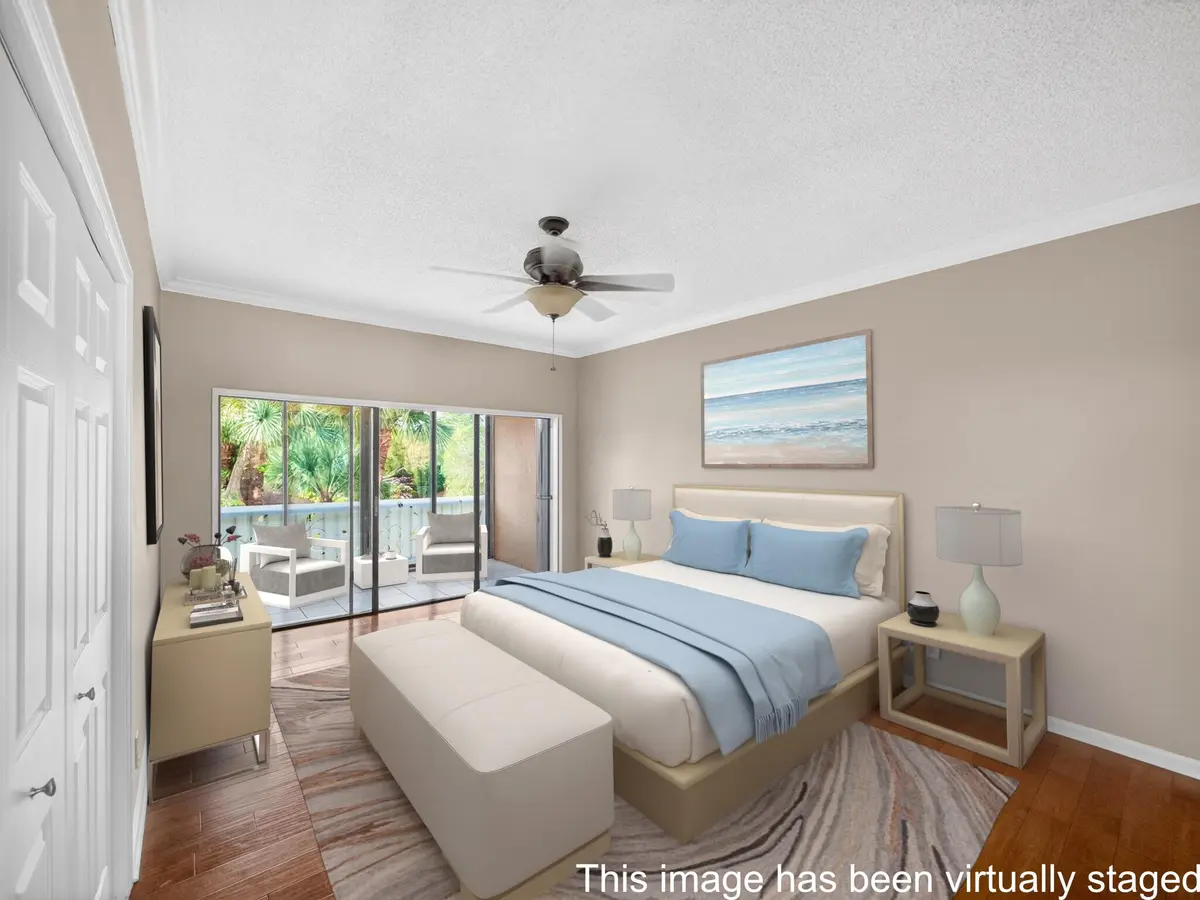 1660 - Primary Bedroom - Staged at 1660 Twelve Oaks Way 303, North Palm Beach