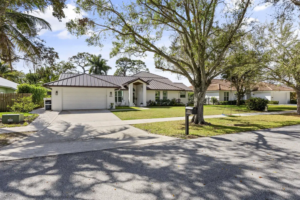 Front at 9806 SE Landing Place, Tequesta