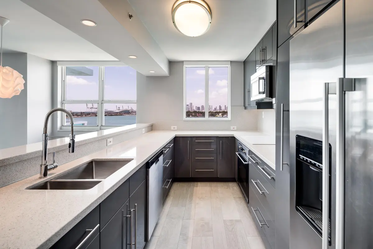 KItchen Living and windows at 650 W West Avenue 701, Miami Beach