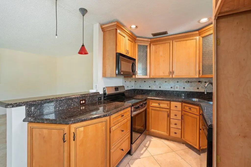 Kitchen L.jpg-SMALL at 56 Windsor C, West Palm Beach