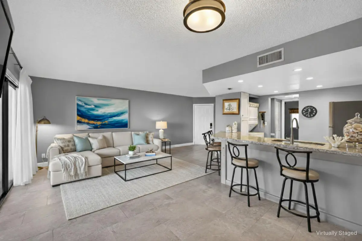 Main Room - Virtually Staged 2 at 1605 S Us Highway 1 D105, Jupiter