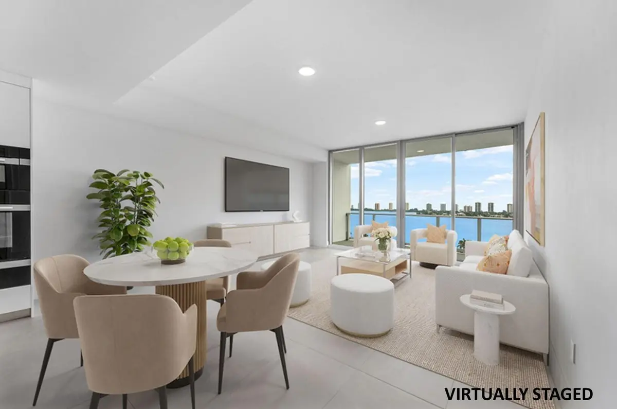 Living & Dining Area Virtually Staged at 220 Lake Shore Drive 1006, Lake Park