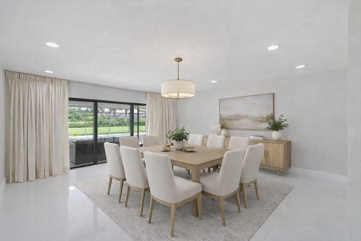 Virtually Staged Dining Room at 516 Muirfield Drive, Atlantis