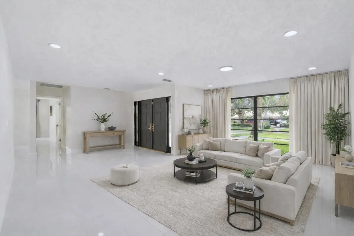 Virtually Staged Foyer/Living Room at 516 Muirfield Drive, Atlantis