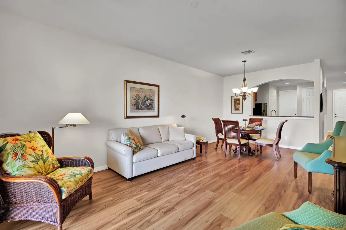 Living Room towards dining room at 6380 Oxford Circle 103, Vero Beach