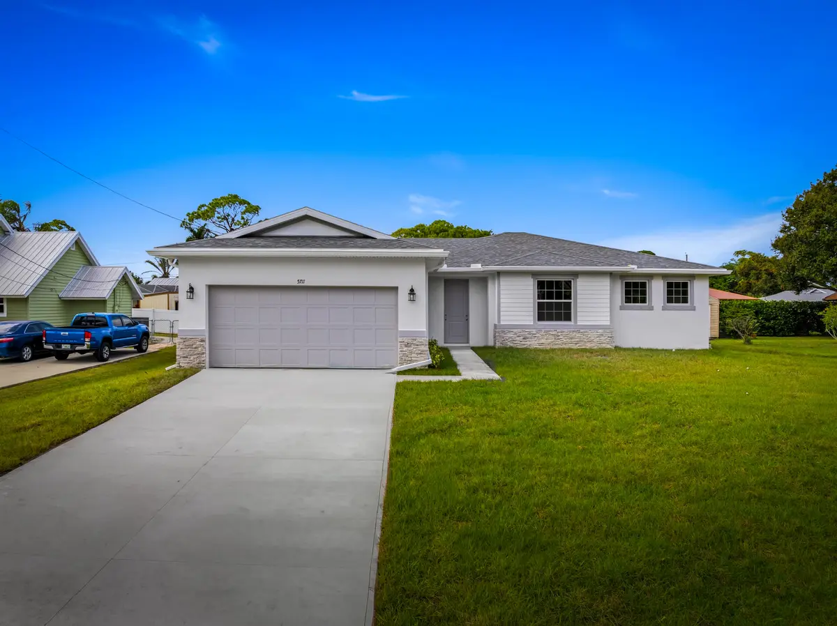 exterior of same model different locatio at 7609 Santa Clara Boulevard, Fort Pierce