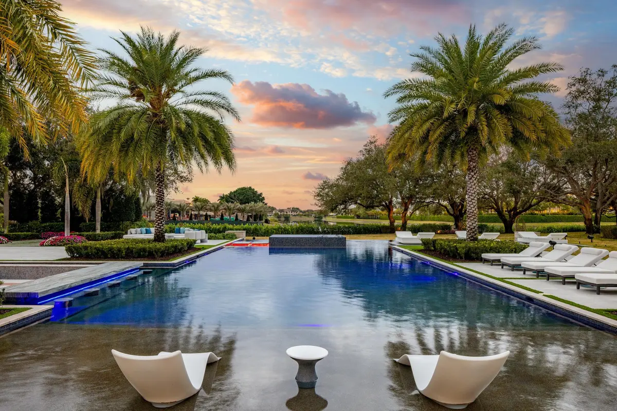 Twilight pool at 16191 Quiet Vista Circle, Delray Beach