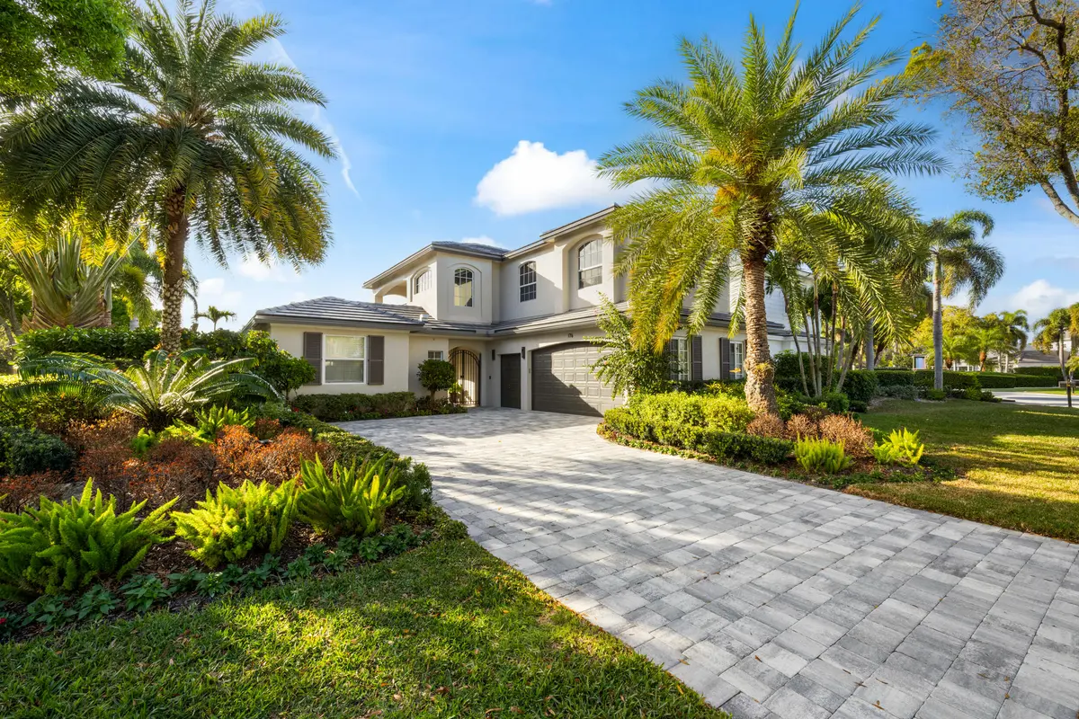 Front Exterior at 176 Golf Village Boulevard, Jupiter