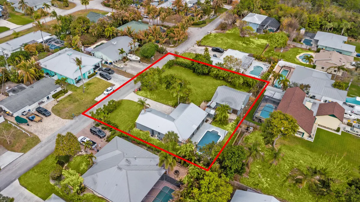 Aerial of main and guest home at 5666 SE Matousek Street, Stuart