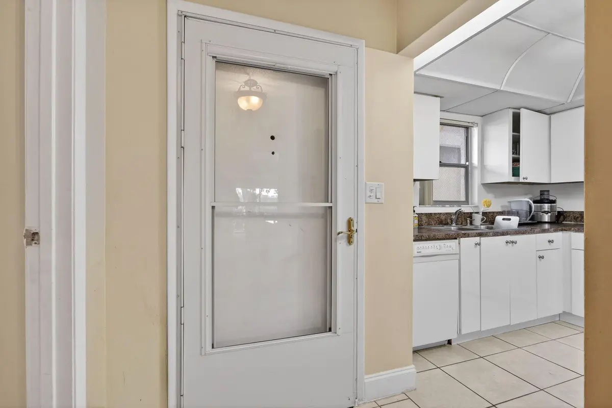 Front Door/Kitchen at 5900 NW 44th Street 115, Lauderhill